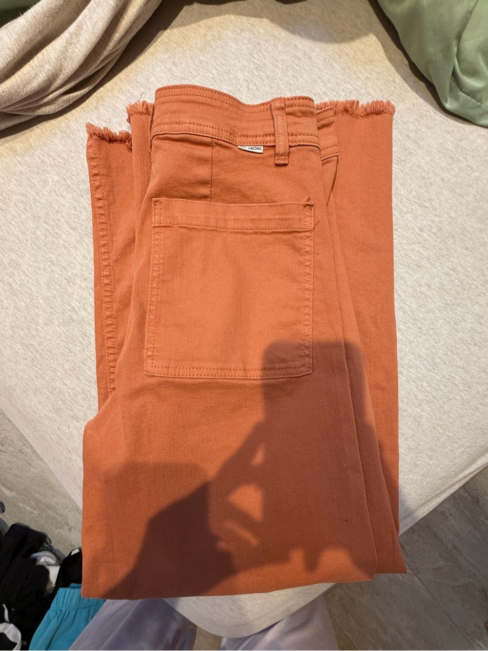 Orange billabong jeans